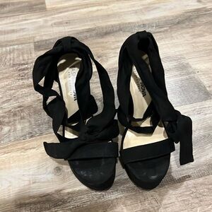 Lightly worn black FashionNova high heels size 6.5 with tie up
